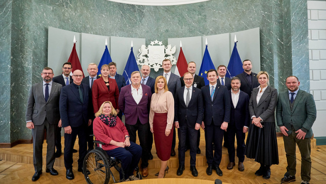 Latvijas Nacionālās sporta padomes sēdes dalībnieki Ministru kabineta Zaļajā zālē. 